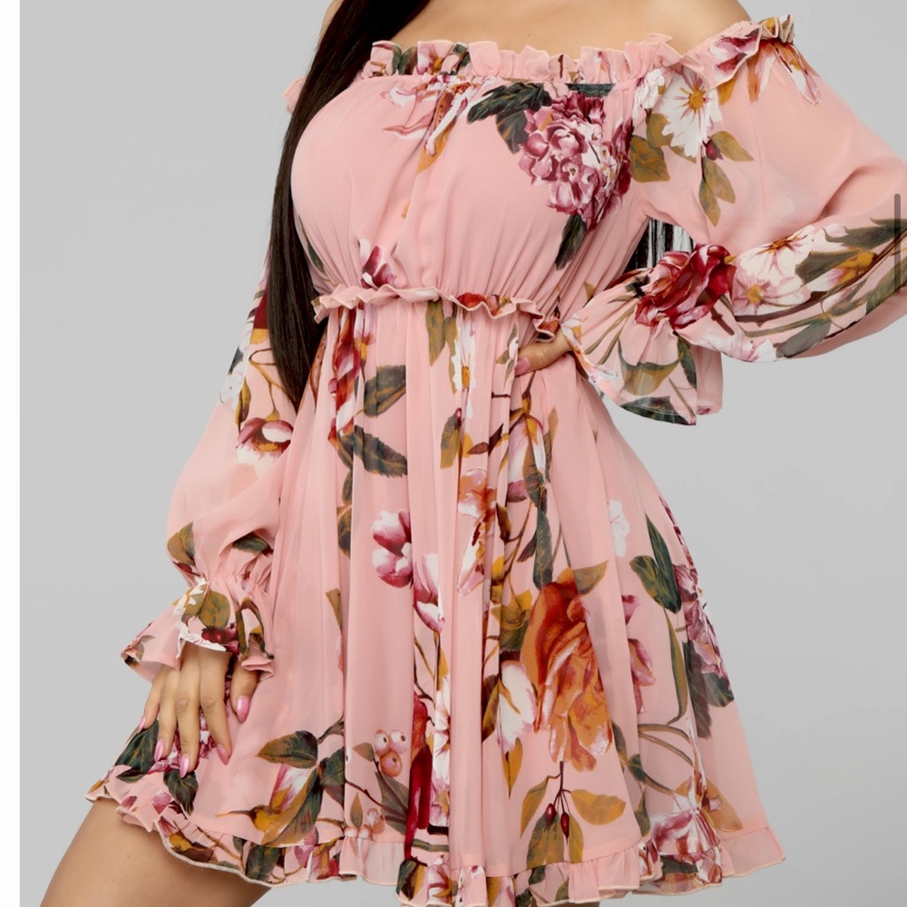 Beautiful flower dress, never worn paid for 2 by accident